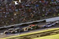 Christopher Bell (20) and Bubba Wallace lead during the NASCAR Cup Series race at Kansas Speedway. Source: Getty